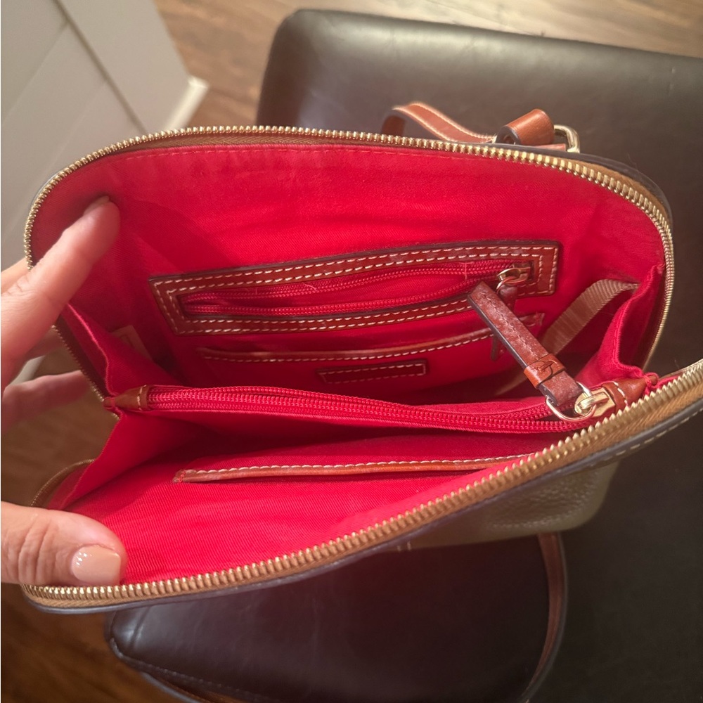 Dooney & Bourke Tan Crossbody Bag with Bold Red Interior